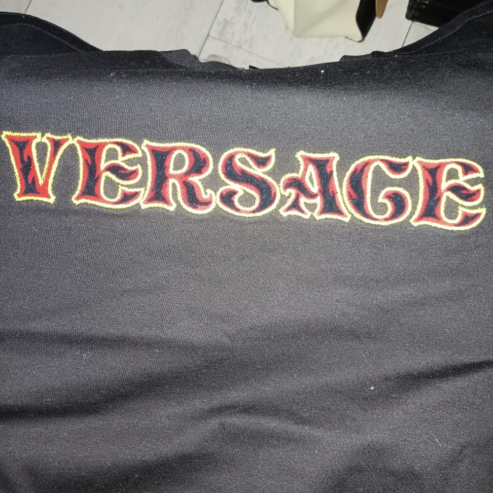 Versace authentic with tags